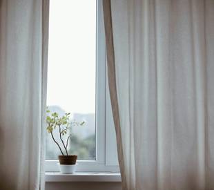 window with white curtains