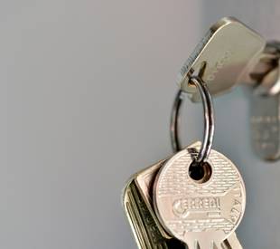 keys inserted in a door lock